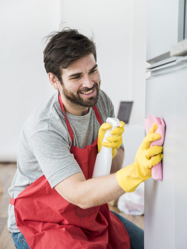 concept-man-cleaning-his-home