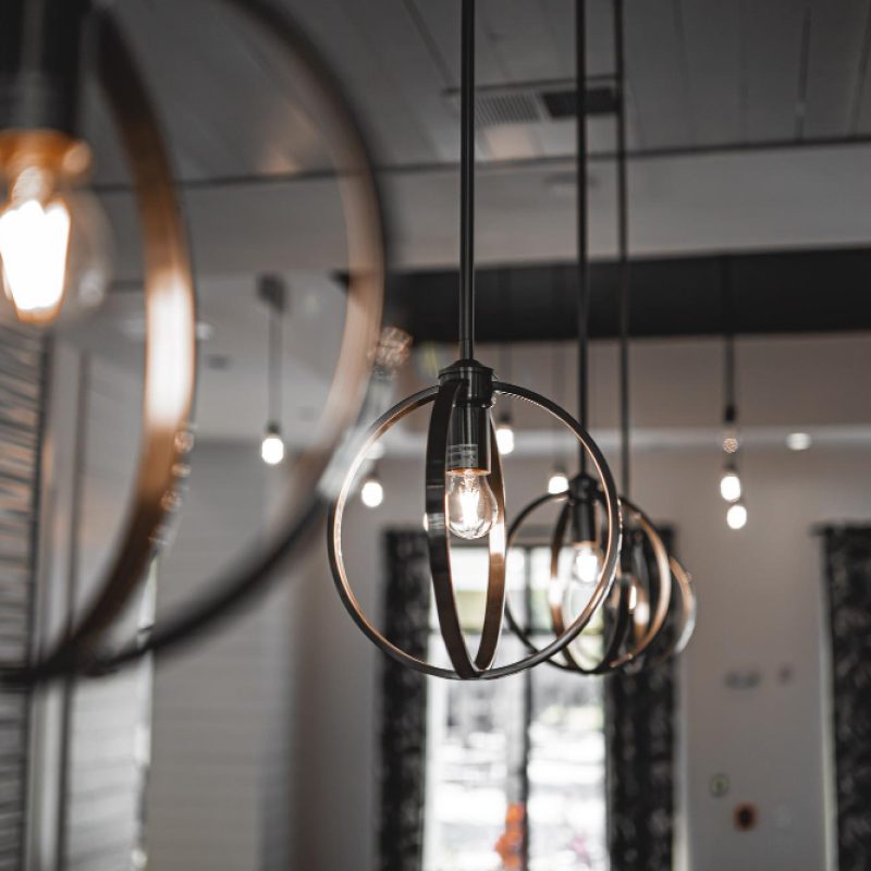 selective-focus-shot-modern-lamp-with-light-bulb-inside-building